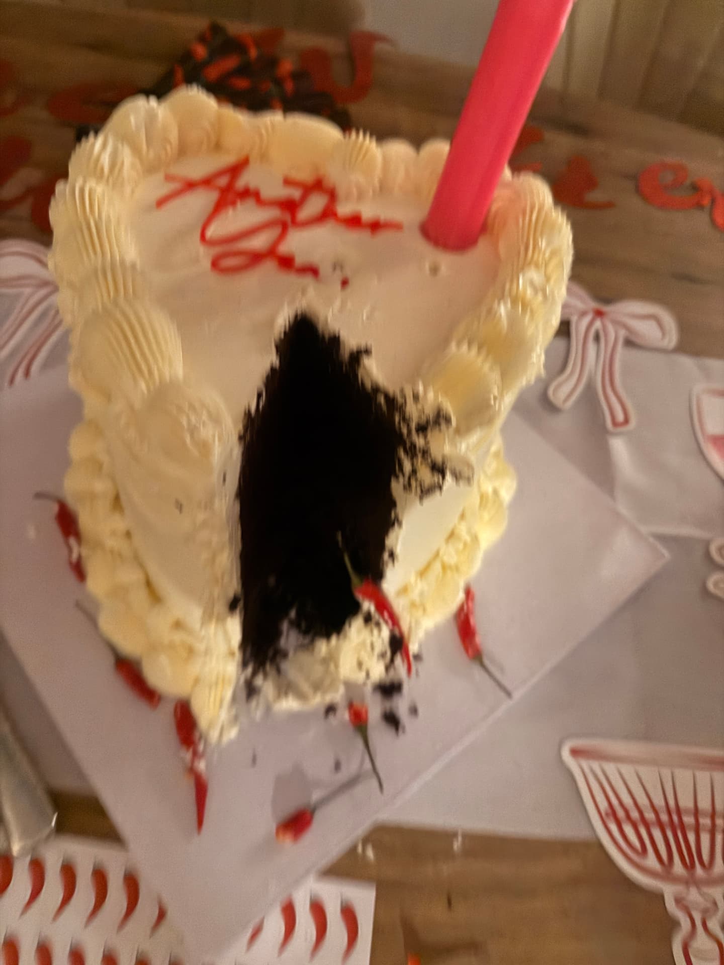 Chilli heart cake cut open showing chocolate sponge